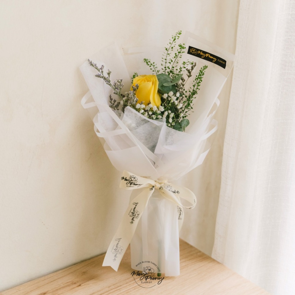 Custom floral gift bouquet prepared with premium presentation